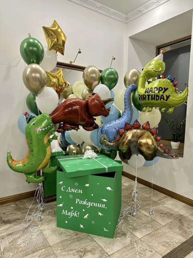 Зелена коробка з динозаврами