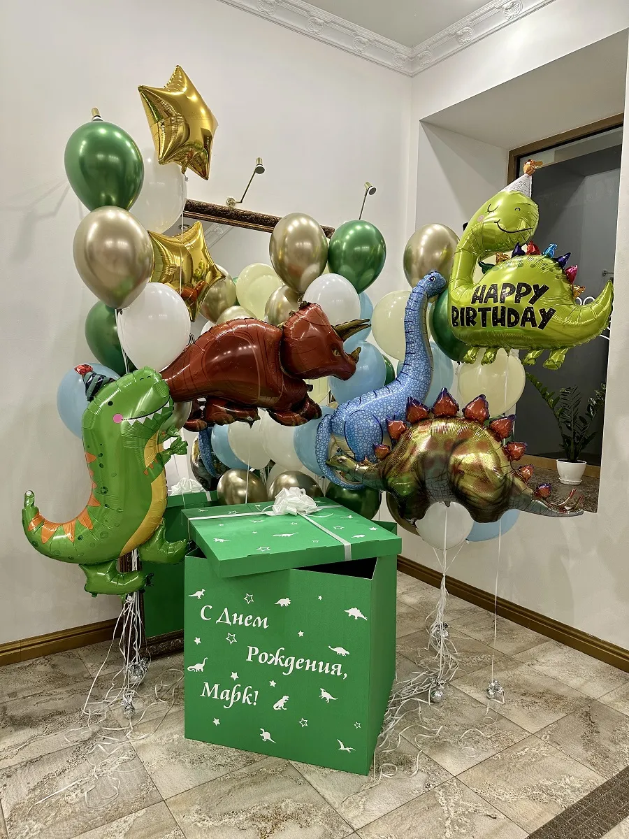 Зелена коробка з динозаврами